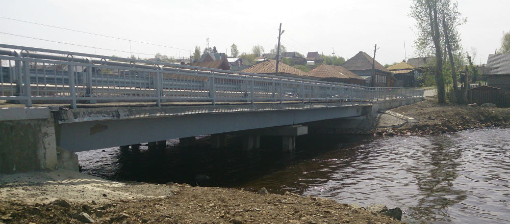 Строительство мостового перехода через р. Сиву по ул. К. Либкнехта в г. Верхняя Тура.